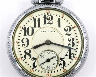 A Hamilton 992 Model Railroad watch.  16 size, 21 j, Adj Temp & 5 pos, DR, DMK, GJS, SW, LS, Keystone Base Metal, OF, Porcelain DSD with Arabic numerals marked "Hamilton".  Serial #2507291.  Minor wear, dial hairlines, winds, sets and running when cataloged.  ESTIMATE $200-300