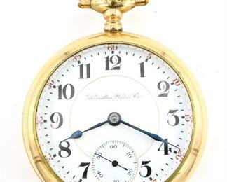 A Hamilton 940 Model Railroad watch.  18 size, 21 j, Adj Temp & 5 pos, DMK, SW, LS, Engraved AWC Co. GF, OF, Porcelain DSD with Arabic numerals marked "Hamilton Watch Co.".  Serial #232463.  Minor wear, sets and running when cataloged.  ESTIMATE $200-300