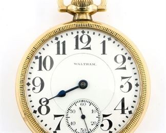 A Waltham "Vanguard" Model Railroad watch.  16 size, 23 j, Adj Temp & 5 pos, DR, DMK, SW, LS, Keystone GF, OF, Porcelain SSD with Arabic numerals marked "Waltham".  Serial #20082514.  Some wear, monogrammed, faint dial hairline, lacks minute hand, winds, sets and running when cataloged.  ESTIMATE $200-300