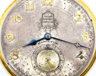 A 14k Gold Hamilton/Packard Motors Model 916 Pocket watch.  12 size, 19 j, Adj Temp & 3 pos, DMK, GJS, SW, PS, 14k Gold Keystone OF, Silvered SD with Gold Arabic numerals marked "Ask The Man Who Owns One, Hamilton.".  Cuvette with engraved presentation "Presented To W. Sikorski, by the Packard Motor Car Co., in appreciation of ten years of loyal service, 1935"  rear cover engraved "E. W. Konrad, 12-25-44".  Serial #3150727.  60.2 grams total weight.  Minor wear, dial discoloration, replaced 14k White Gold bezel, winds and sets and running when cataloged.  ESTIMATE $1,000-1,500