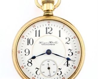 A Hampden "John Hancock" Model Railroad watch.  18 size, 21 j, Adj Temp & 5 pos, DR, DMK, GJS, SW, LS, engraved GF, OF, Porcelain DSD with Arabic numerals marked "Hampden Watch Co., Canton, Ohio".  Serial #2275470.  Case wear, recased, lacks cuvette, winds stiffly, sets and running when cataloged.  ESTIMATE $100-150