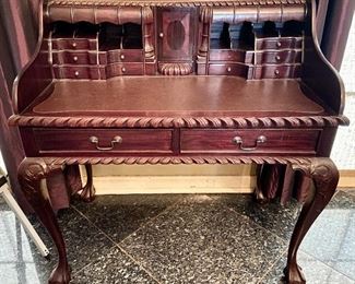 $395
Leather-top desk with hidden drawers