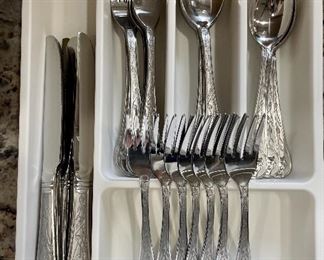 Item 179:  Set of Reindeer Silverware:  $55                                                                                    8 dinner forks, 8 knives, 7 salad forks, 8 teaspoons, 8 soup spoons