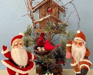 Item 221:  Two dancing Santa's, Elf, and Bird House:  $28                                       Tallest - 15"