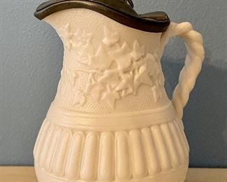 Item 302:  19th c. English salt glaze stoneware pitcher with pewter lid:  $95
