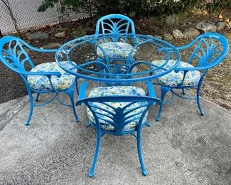 Item 390:  Sky Blue Bistro Set, glass top, custom cushions:  $750                                                                                                      Table - 48" x 29"                                                                                               (4) Chairs - 23"l x 19.5"w x 33.5"h