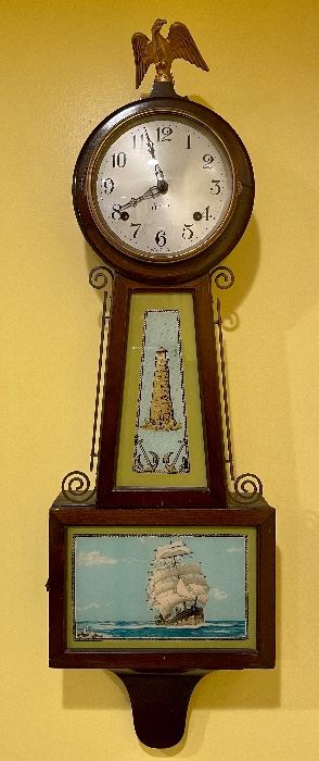 Item 45:  Antique Sessions Banjo Clock Ship Sea Scene Reverse Painting Light Tower House - 10.25" x 34":  $245