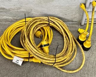 Item 394:  (2) 50' Marine Shore Power Cords (left):  $245 ea                                                                                                            Item 395:  (2) Marine Shore Power Pigtail Adapters (right): $125