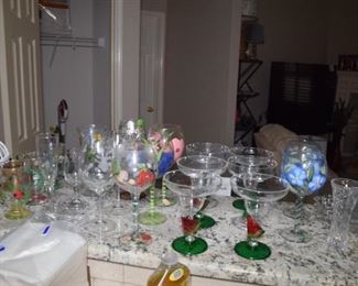 Wine glassses galore, many hand painted