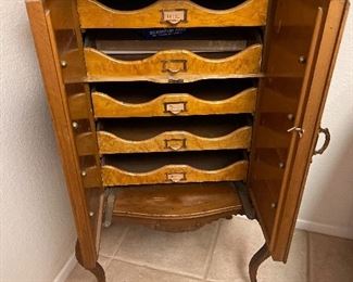 Inside antique painted cabinet.