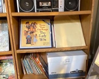 Vintage stereo equipment and record albums.