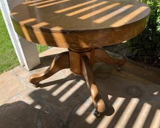 Round Vintage oak claw leg dining table.