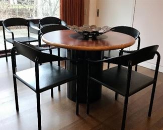 Contemporary pedestal  wood & metal game table 

8 Contemporary Italian leather & tubular metal  arm chairs 