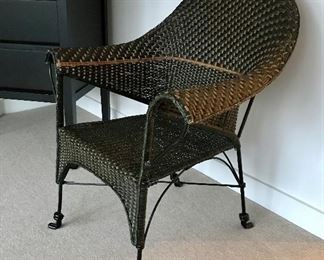 Wicker and metal arm chair