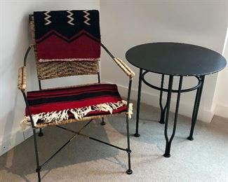 Rattan & iron chair

Kilims 

Steel side table 