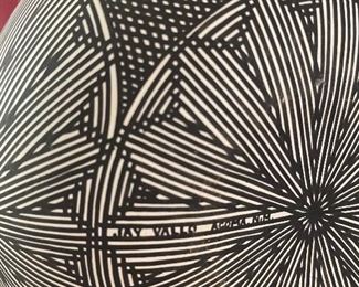 close up of jay vallo signed piece 