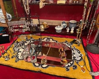 all kinds of costume jewelry- lots of chicos=  monet-  coldwater creek and much more- have some clips and screwbacks also  