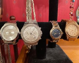 owner put batteries in most of these watches-  kors- seiko - guess and more