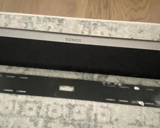 Sonos sound bar with wall attachments and bridge