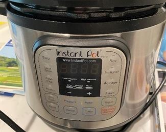 Instant Pot with cookbooks