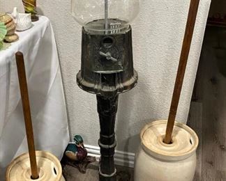 Vintage 1 cent Gumball Candy Machine and we have 3 Antique Butter Churns.