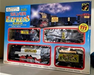 WE HAVE 2 IN BOX VINTAGE SILVER EXPRESS TRAIN SETS.