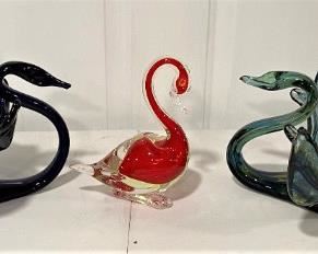MANY GORGEOUS HANDBLOWN GLASS SWANS AND MUCH MORE.