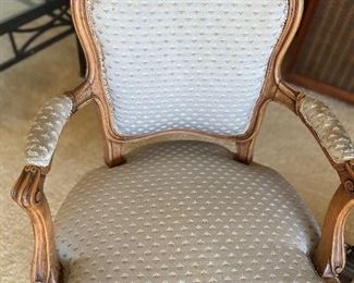 One of a pair of antique french arm chairs with spring seats. cabriole legs. fabric is as found - some spots and wear. $380