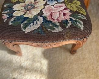 Needlepoint footstool as found (needlepoint has a patch seen in the front of the photo). Louis XV style  valued at $275- $400. 14"w x 11"d x 7.5"h.  $80