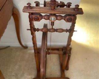 Antique spinning wheel 35"h x 15"w.  Wheel itself is 21" in diameter.   $120