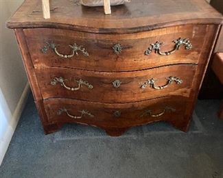Antique bombe shape three drawer chest with inlaid detail on the top original hardware.  $260 