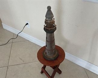 about 2ft tall lighthouse of wood