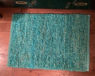 Small teal rug 