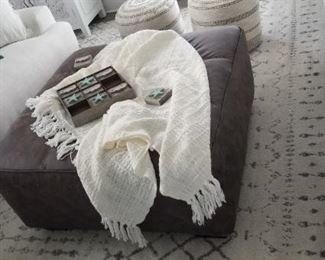 Oversize leather ottoman; rug