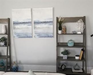 Artwork, decorative objects, two slant bookshelves. Floor lamp NOT for sale.