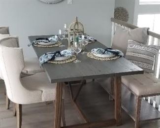 Rustic dining room table; two upholstered side chairs, ; select dishes, napkins & placemats