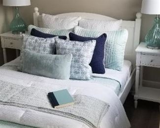 Two full/double mattresses; full-size bedding; rug; artwork also for sale