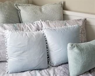 Select decorator pillows; beautiful full/double bedding; two full/double mattresses