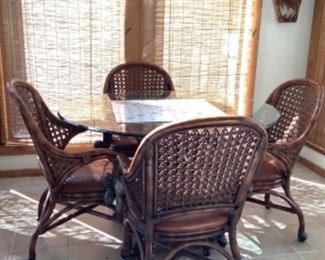Glass Table with Rattan/Leather Rolling Chairs. Excellent condition