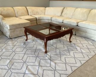 Large Ivory & Floral Couch. Square Glass & Wood Coffee Table