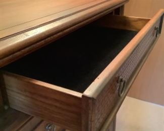 Velvet top drawer. Wood for the bottom drawers.