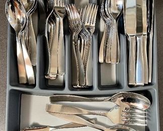 Item 28:  Service for 12 Mikasa "Satin Loft" Silverware Set:  $85