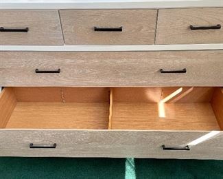 bottom drawer has two clothing dividers