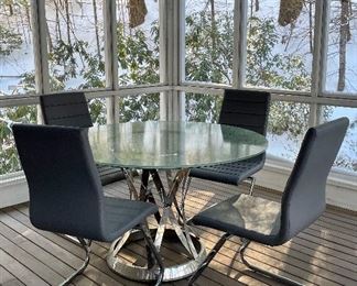 Item 56:  Wonderful Crackle Glass Top Table with Chrome Base with 4 Faux Leather Chairs (could be used as a kitchen set or on a 3-season porch):  $445/Set                                                                         Table - 48" x 29"                                                                                               Chairs - 17"l x 18"w x 37.5"h 
