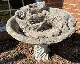Concrete bird bath.