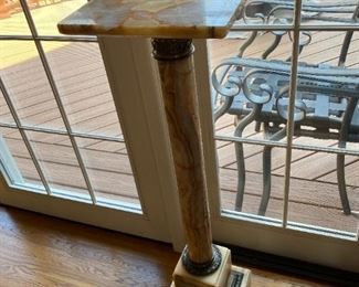 Marble pedestal.