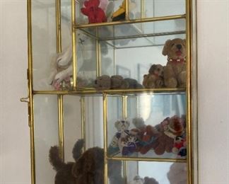 Glass case with miniatures.