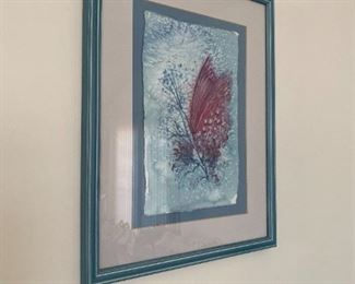 Framed butterfly print.