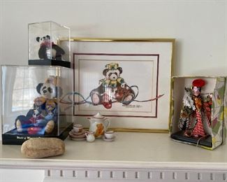 Asian doll and pandas in cases.