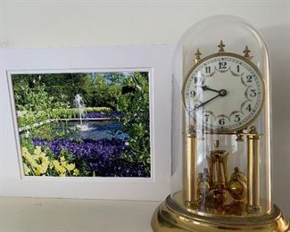 Glass domed anniversary clock.